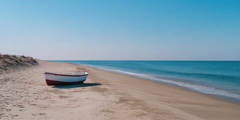 Naklejka premium A solitary boat rests on a serene sandy beach, evoking feelings of nostalgia and adventure while capturing the timeless beauty of nature's coastline.
