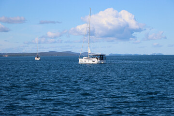 Fototapeta premium sailboats in the sea against the blue sky