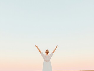 Obraz premium Woman in White Dress with Raised Arms at Sunset on Hilltop - Minimalist Spring
