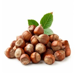 Fototapeta premium Heap of hazelnuts with leaves is lying on a white background