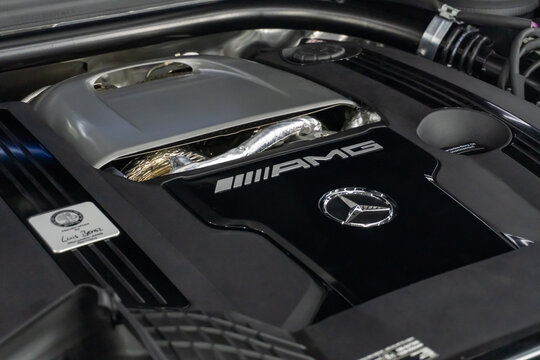 The Mercedes-Benz G63 AMG 4x4 W463 engine close-up. Close up of Mercedes Benz AMG Gel&auml;ndewagen engine. Car engine. Car engine and parts under hood bonnet.