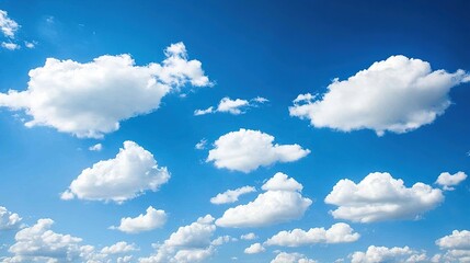 Vivid blue sky with fluffy white cumulus clouds. (1)