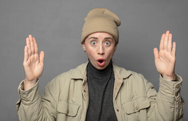 holding an object with both hands, showing, offering or advertising an object