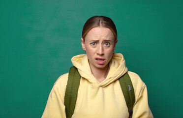 feeling terrified and shocked, with mouth wide open in surprise