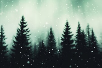 Fototapeta premium A close-up of a snow-covered forest with trees in the background surrounded by falling snow and blurred.