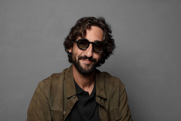Fototapeta premium young bearded man wearing sun glasses
