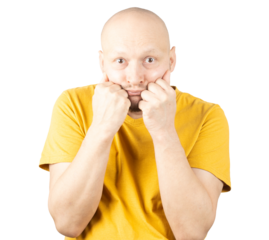 Portrait of a Man in Yellow T-Shirt Displaying Nervous Emotion