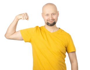 Strong Man in Yellow T-Shirt Flexing Arm and Smiling Confidently