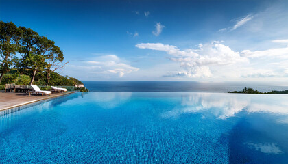 Fototapeta premium luxurious infinity pool overlooking tranquil ocean waters