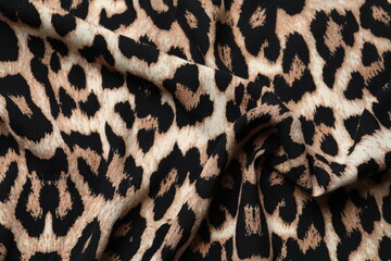Leopard fabric background close up view
