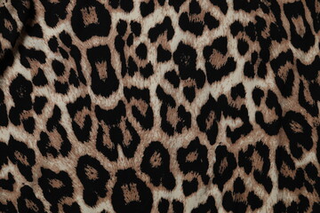 Leopard fabric background close up view