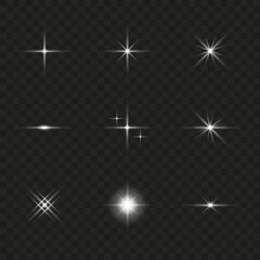 A set of white light effects on a dark background. Collection of vector flares. White glare. Vector illustration EPS10