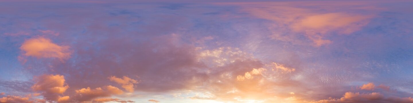 360 panorama of glowing sunset sky with bright pink Cumulus clouds. HDR 360 seamless spherical panorama. Full zenith or sky dome sky replacement for aerial drone panoramas. Climate and weather change.