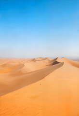 Desert landscape with towering sand dunes 