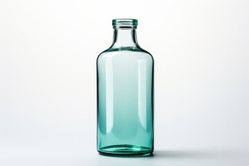 Clear glass bottle with a turquoise tint on a simple background, perfect for beverages or decor purposes in home settings
