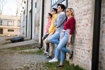 Group of young adults having fun outdoors
