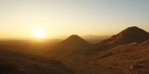 Fototapeta premium A stunning sunset casts golden hues over majestic mountains, creating a serene and breathtaking landscape that embodies tranquility and nature's beauty.