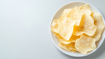 Crispy flatbread snacks on plate, light background