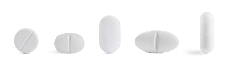 Different pills in row isolated on white, set