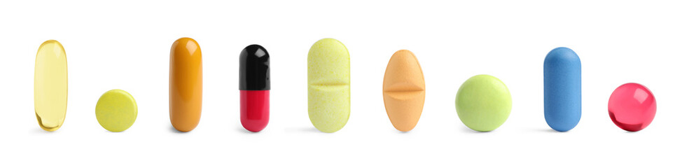 Different pills in row isolated on white, set