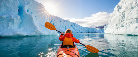 Lone kayaker navigating icy blue waters surrounded by glaciers, adventure
