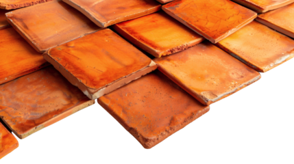 A patch of orange tile flooring with a warm tone on a white background