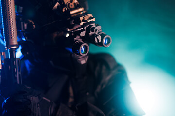Tactical Operator Wearing Night Vision Gear in a Dramatically Lit Scene