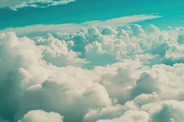 Aerial view of a plane soaring through white clouds in the sky