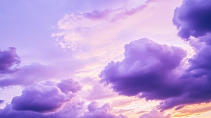Obraz premium A plane flies through clouds as the sun sets behind, suitable for use in travel or adventure themes