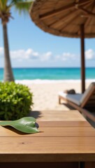Obraz premium Wooden tabletop bar showcases a resort-style setting featuring a blurry beach backdrop and coconut leaf design