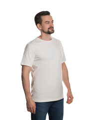 Fototapeta premium Man in blank t-shirt on white background. Mockup for design
