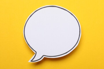 Fototapeta premium Blank speech bubble on yellow background. Space for text