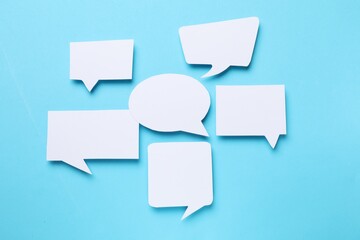 Blank speech bubbles on light blue background. Space for text