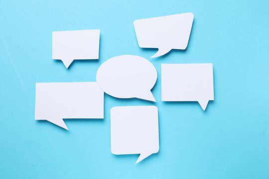Blank speech bubbles on light blue background. Space for text