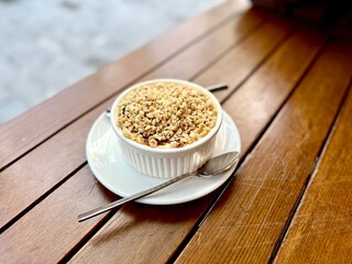 Sutlac turkish rice pudding with chopped hazelnuts