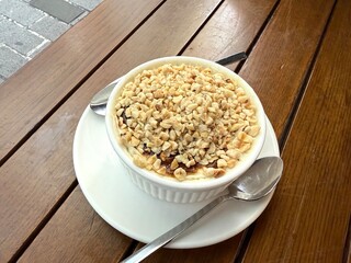 Sutlac turkish rice pudding with chopped hazelnuts