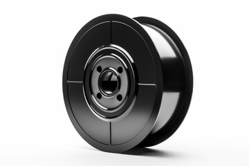 Detailed view of a shiny black spool with metal core, showcasing its design and structure in a studio setting