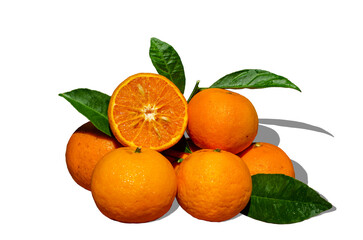Whole and halved ogrange friuts isolate on white background