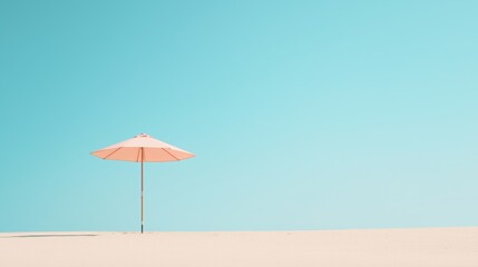 Pastel-colored parasol under clear blue sky for tranquil beach design