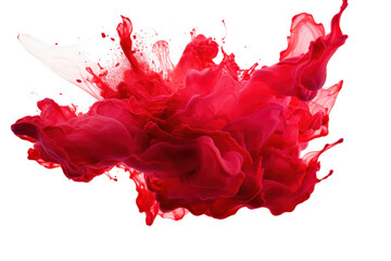 Vibrant red ink swirling and forming abstract shapes against a white background in a creative art...