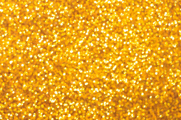 A gold background with a lot of small circles