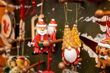 Christmas decoration at the Christmas market fair in the center of European city. Vienna Christmas market on the main square with colorful lights, candles and round balls for decorating fir tree