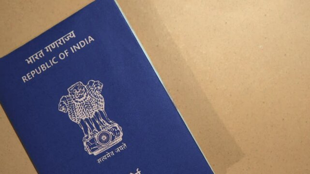 Indian passport placed on the side with copy space, 4k footage for traveling and nationality concept