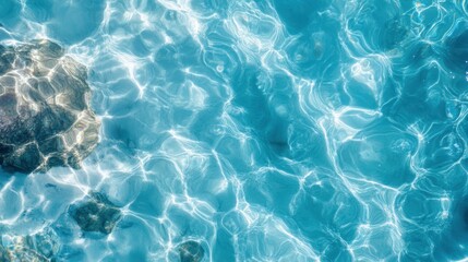 Close-up of sea surface under sunlight. Highly detailed photograph of blue water pattern. Professional photographer captures delicate water surface 