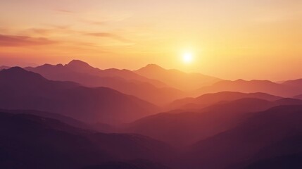 Fototapeta premium Sunset over majestic mountain range with vibrant sky and silhouetted peaks