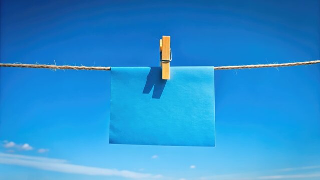 Minimalist Blue Note on Clothesline - Creative Photography for Ads & Presentations