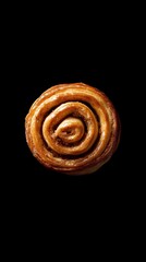 Fototapeta premium Single Cinnamon Roll on Black Background