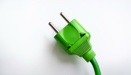 Green electric plug on white background. Sustainable energy concept.