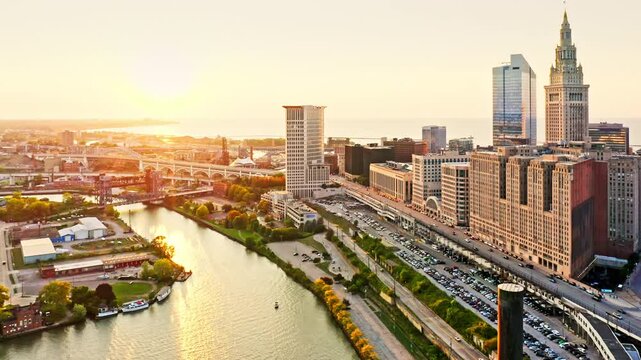 Aerial revealing shot of Cleveland, Ohio skyline at sunset. Cleveland is a major city in the U.S. state of Ohio and the county seat of Cuyahoga County.