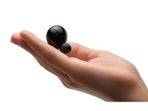 Black Earbuds Held in Hand for Technology Showcase Isolated on transparent background